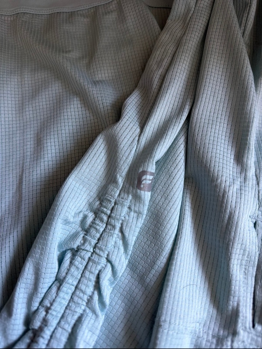 Fabletics Light Blue Textured Jacket with Subtle Logo